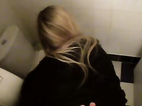 Four eyed blonde sucks cock in public toilet